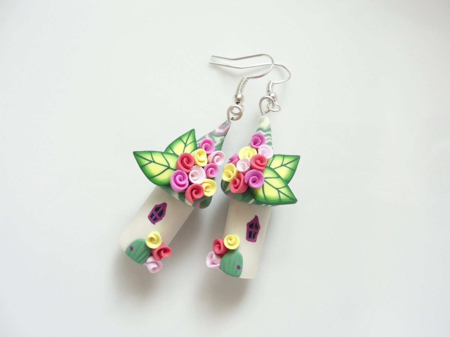 Miniature fairy house earrings in pink, green and yellow handmade from polymer clay