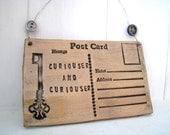 Curiouser and curiouser - Ceramic postcard with vintage buttons. Alice in Wonderland. Made in Wales, UK.  Black