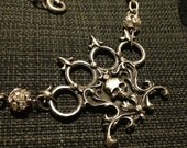 Victorian style Knuckle Duster Necklace.
