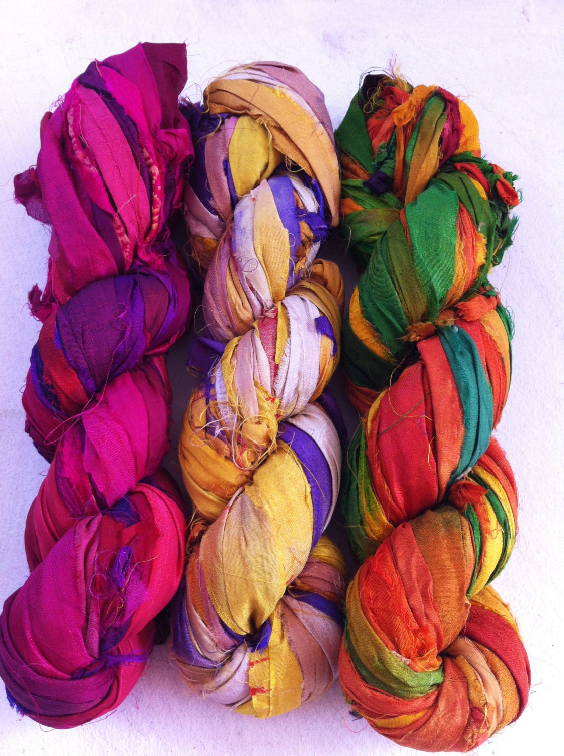 Recycled sari silk ribbon. Art yarn. 300g. Mixed bag of 3 skeins. Unique ethical art yarn. Vibrant hues.