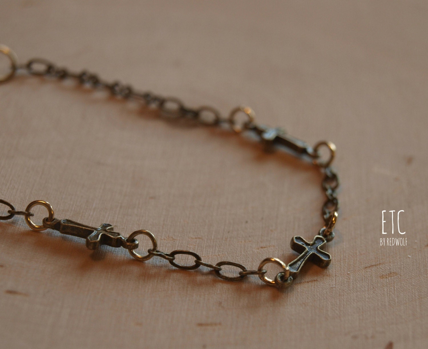 Sideways Cross Vintage Brass Charm Bracelet