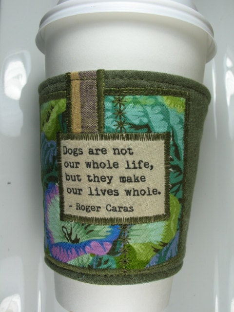 Coffee Cup Cozy -  Dogs make our lives whole Quote by Roger Caras