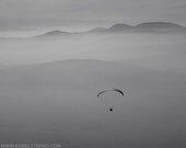 Zen art, adventure photography, paraglider in the mist, mountain view, monochrome picture, minimalist photo, 8x10