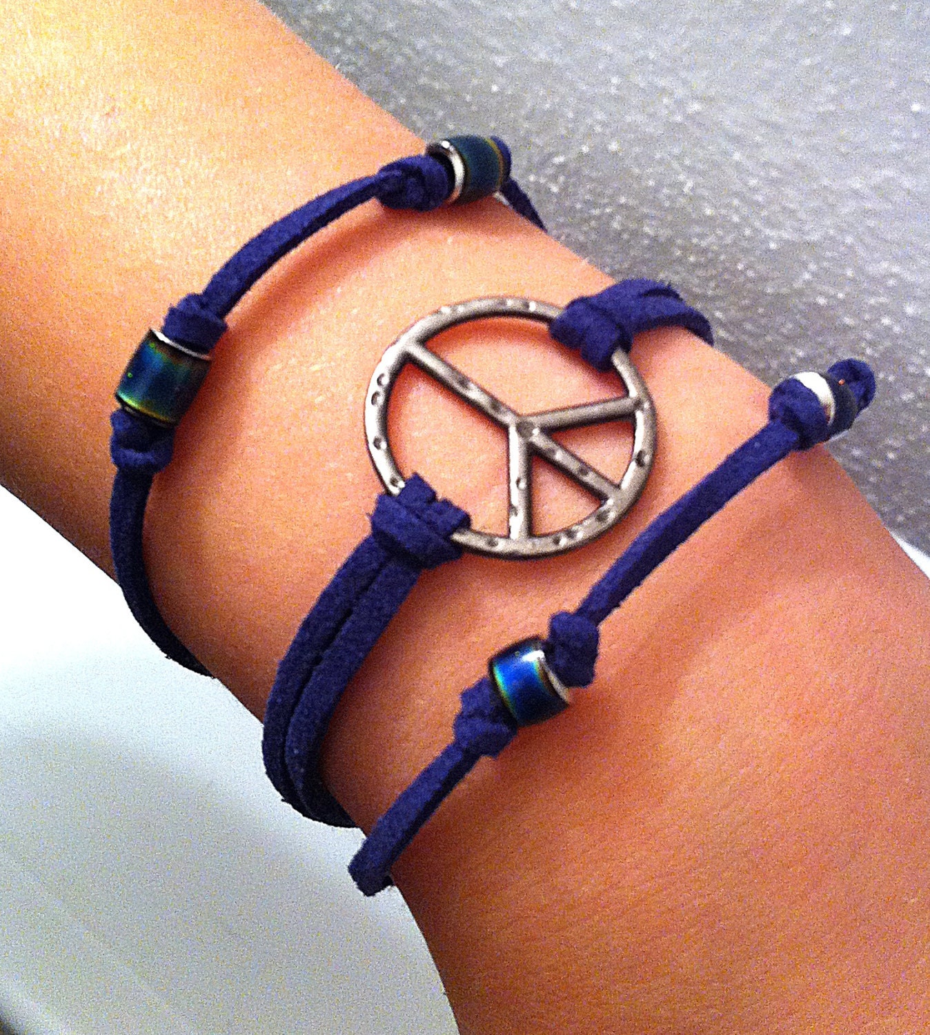 Peace sign and mood beads on navy blue leather cord stackable bracelets