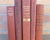 Vintage book collection in shades of paprika cinnamon nutmeg five old books - FreeParking