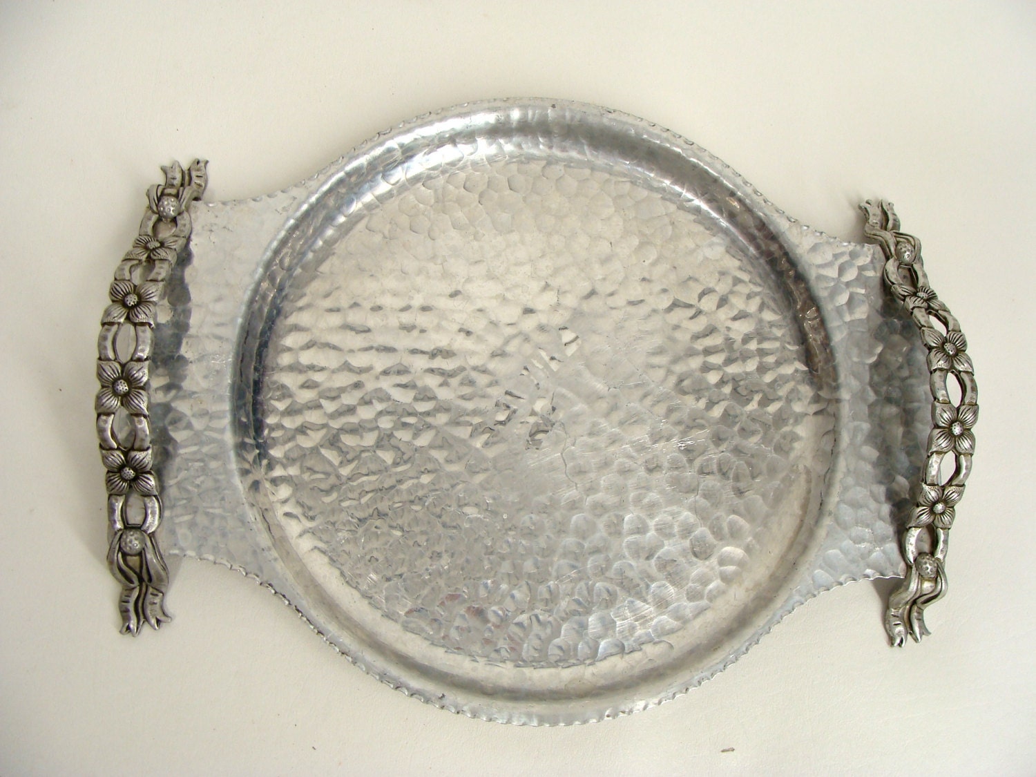 1950s Rodney Kent Ribbon and Flower Handles Hand Wrought Creations Hammered Aluminum Serving Tray or Plant Saucer Drip PanTray
