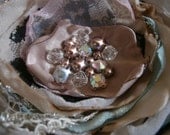 Big flower brooch in ivory, mauve, light green and black with pearls and crystals