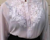 sheer white blouse with floral embroidery size large