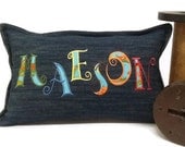 Denim pillow cover with custom embroidered name and invisible zipper