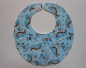 Baby bib, four soft layers, reversible, blue with blue dinos