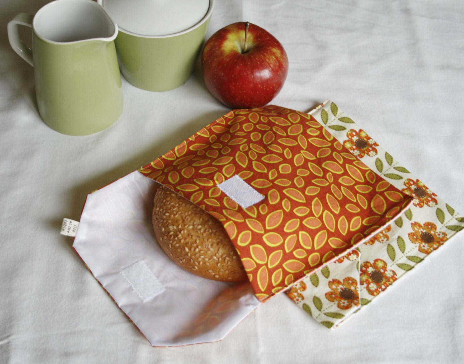 pair of reusable, lined sandwich bags in rust flowers & leaves