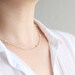 Crystal Dot Necklace - beaded bezel set tiny crystals solitaires on delicate gold chain