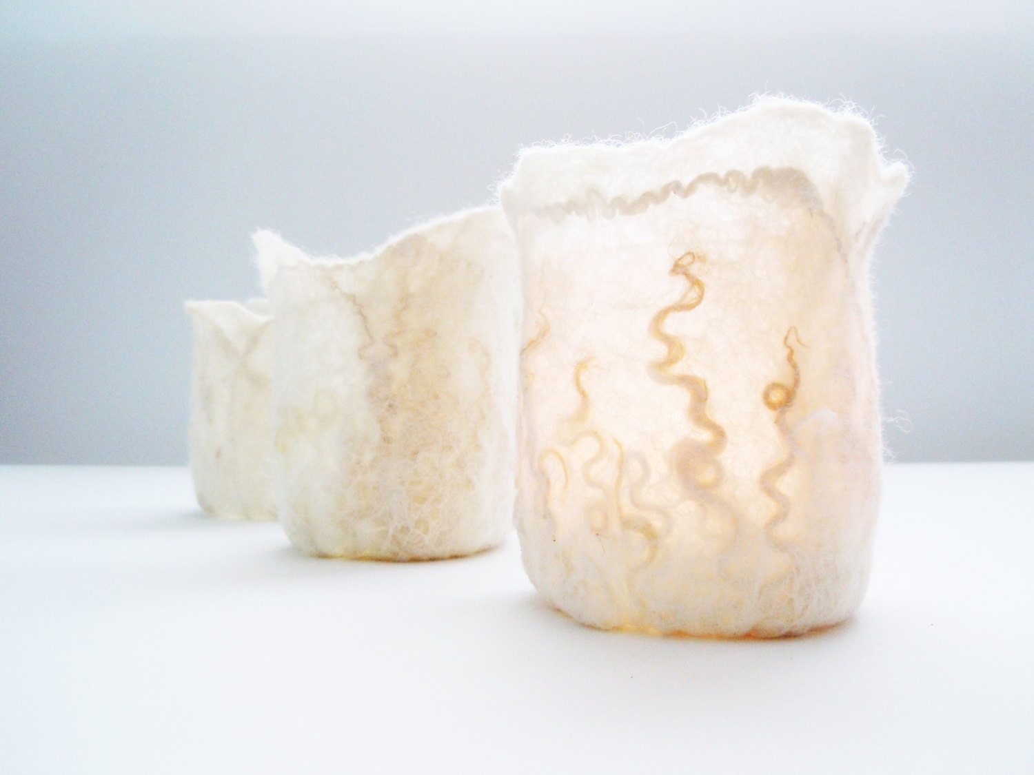 Felted tea light candle holder