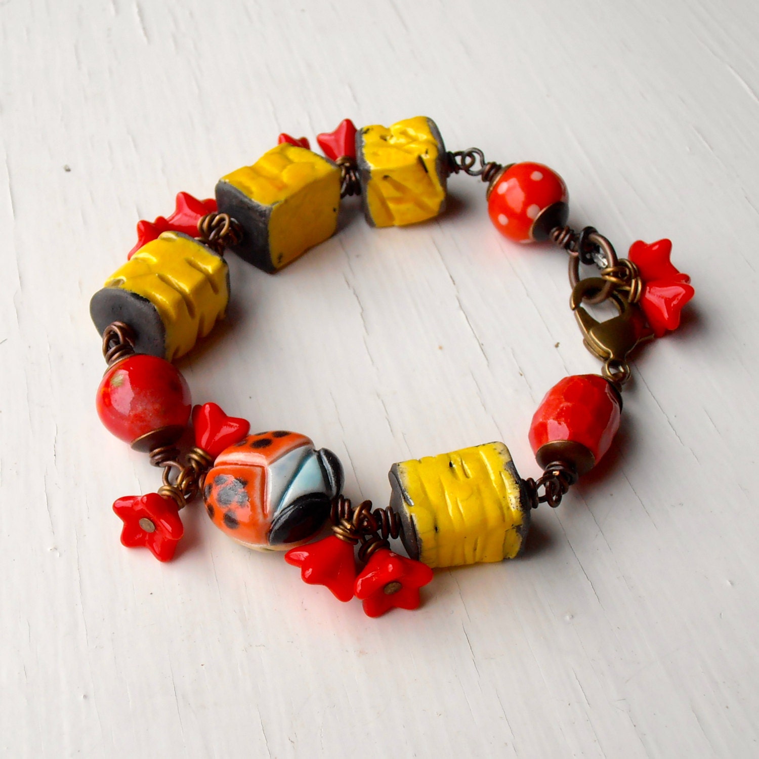 Fly Away Home - handmade bracelet, yellow bracelet, ladybird bracelet, chunky bracelet, whimsical bracelet, red bracelet, wirework bracelet