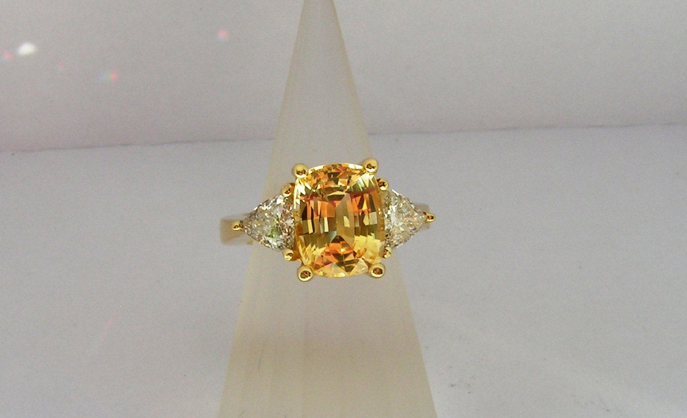 Incredible cushion cut yellow sapphire ring by Kay Knight Designs