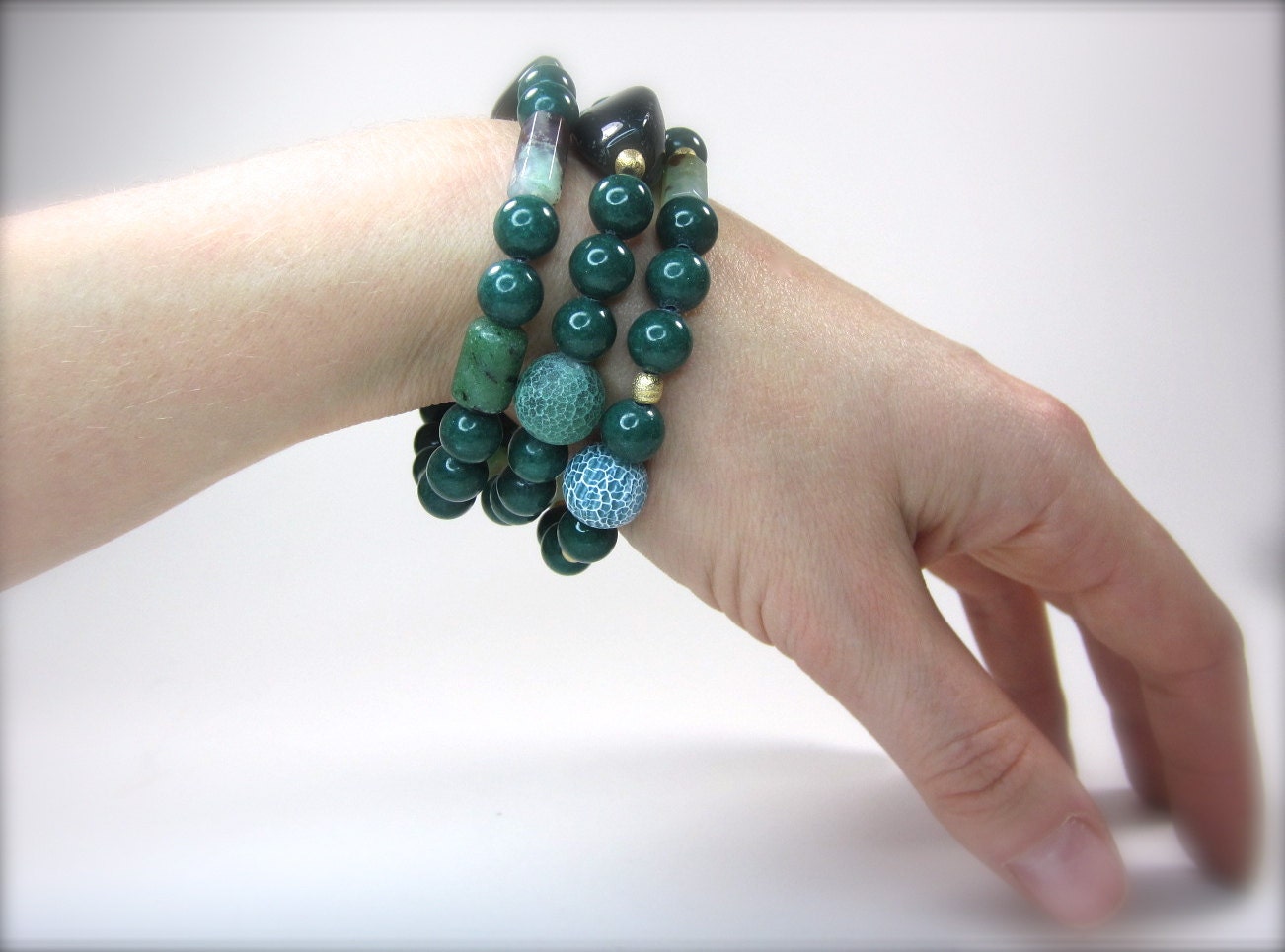 Green stacking bracelets. Stretch stackable bohemian bracelets set with green agate and gold vermeil. Natural stone jewelry.