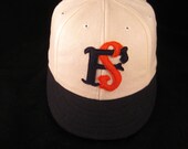 Custom made 8 panel Baseball cap with custom logo, wool flannel with supple leather sweatband.