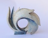 White bird sculpture.Circle bird