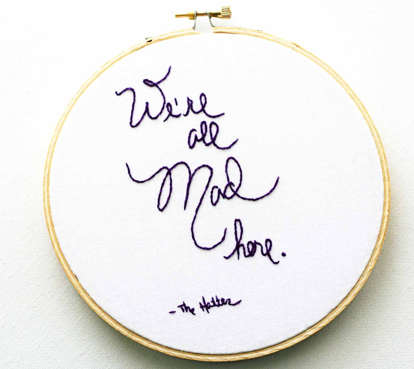Purple embroidery hoop art / Alice in Wonderland quote / We're all mad here. - The Hatter / 6 inch size