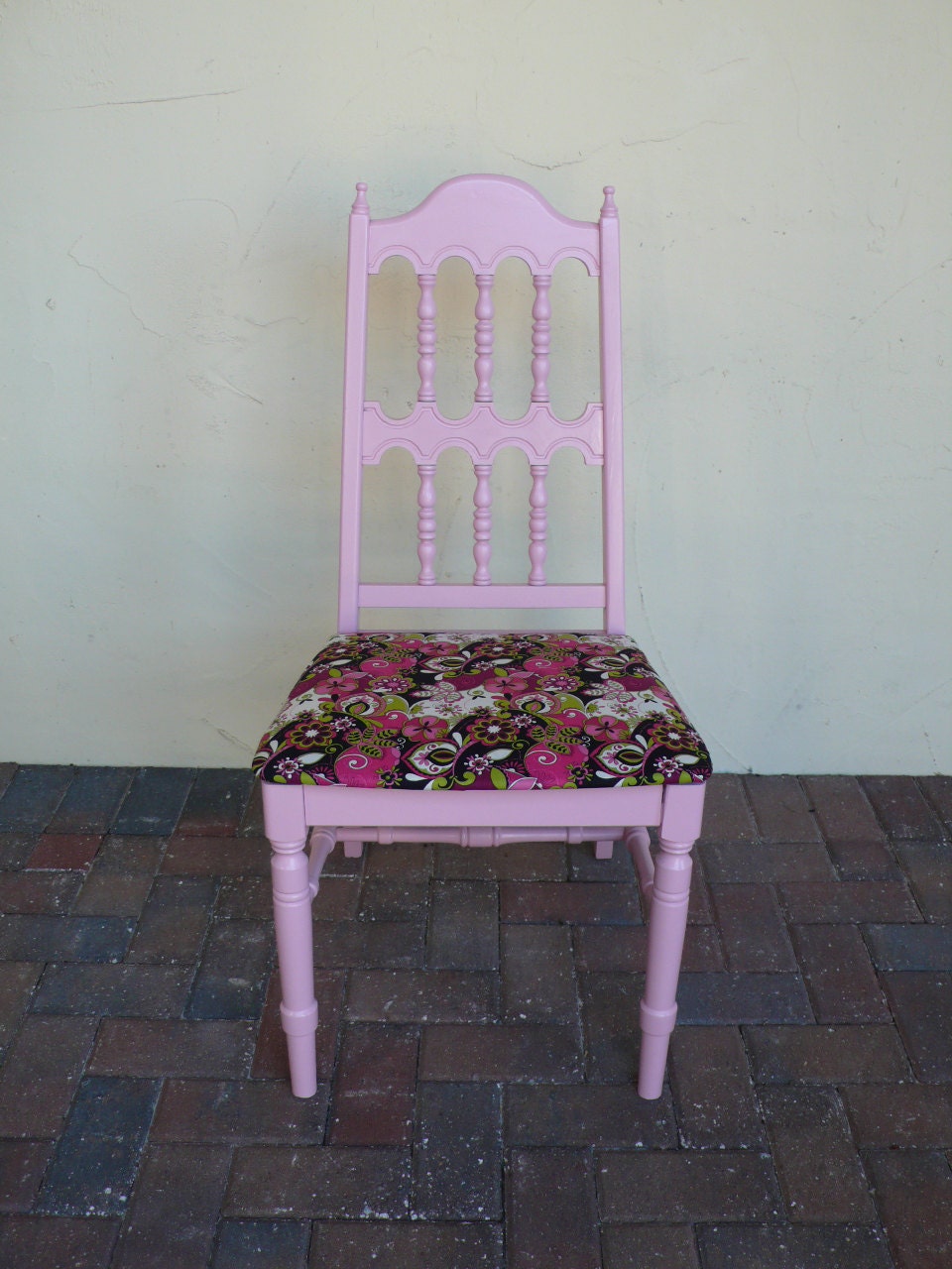 Pink wood vintage vertical ladder back chair with bright green and pink fabric