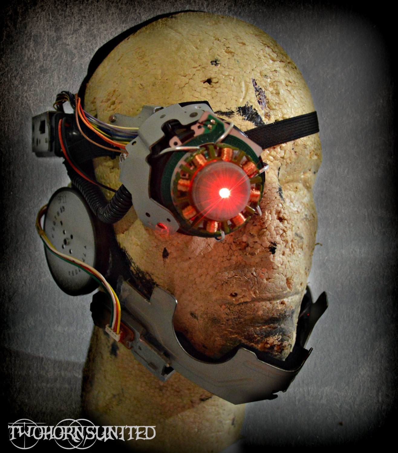 The Cyberenhancer laser cyborg eye DJ cyberpunk face piece with 80mw stage laser.