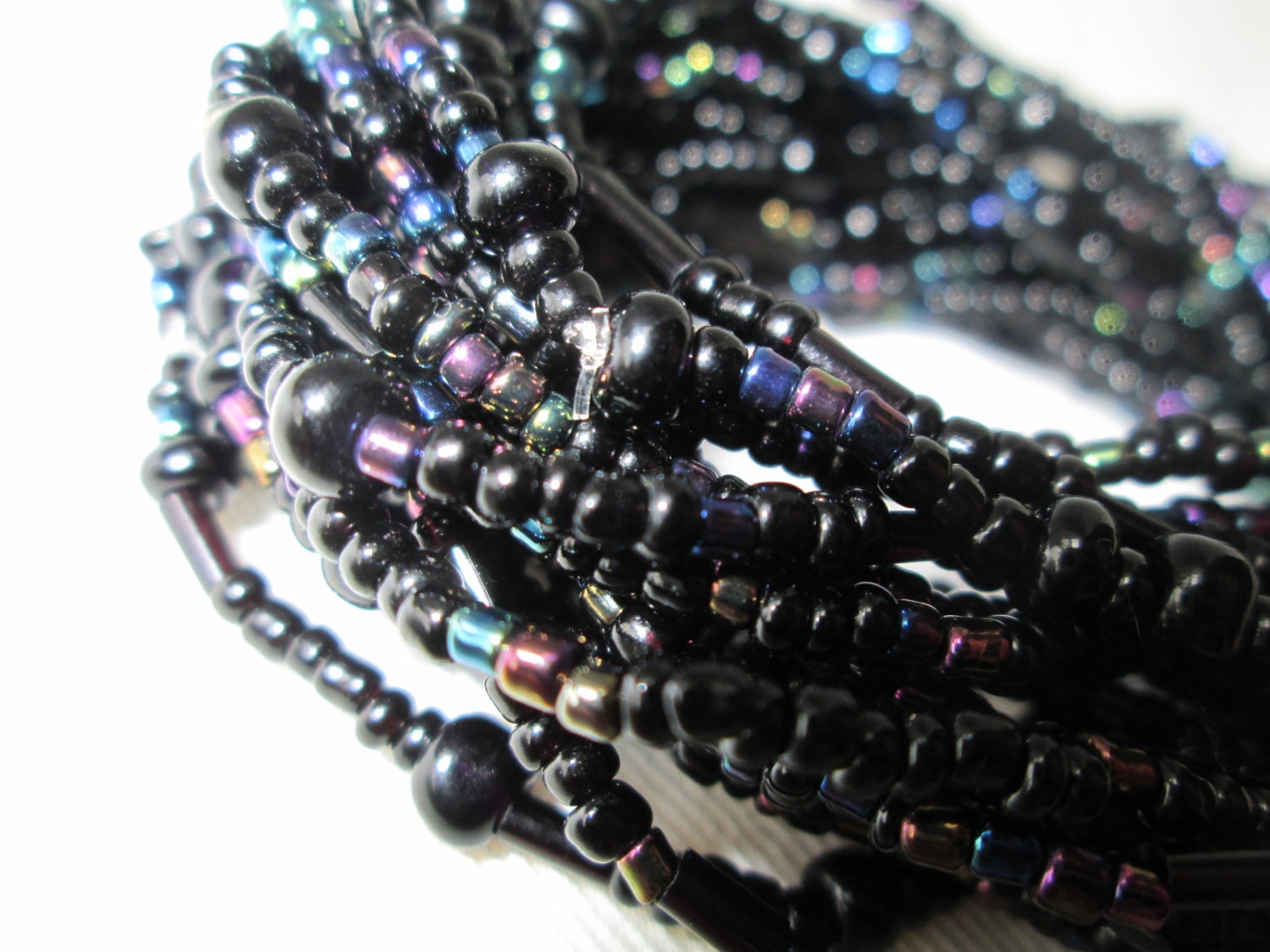 20 qty: Black beaded stretch bracelets, pearl black,  iridescent finish.