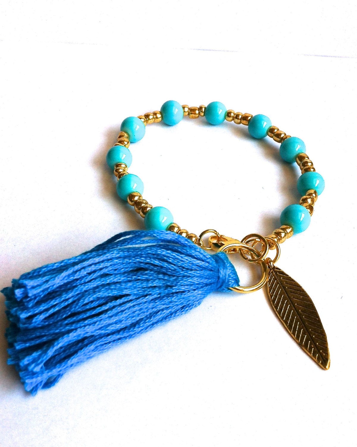 Bright Turquoise & Gold Beaded Tassel Bracelet with Gold Leaf Charm - Wire Bracelet with Clasp - Layering Bracelet- Tassel Bracelet
