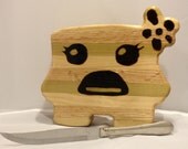 Hand crafted BANDAID GIRL CHEESE cutting board
