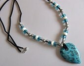 Turquoise, Silver, Bone, and Glass Necklace