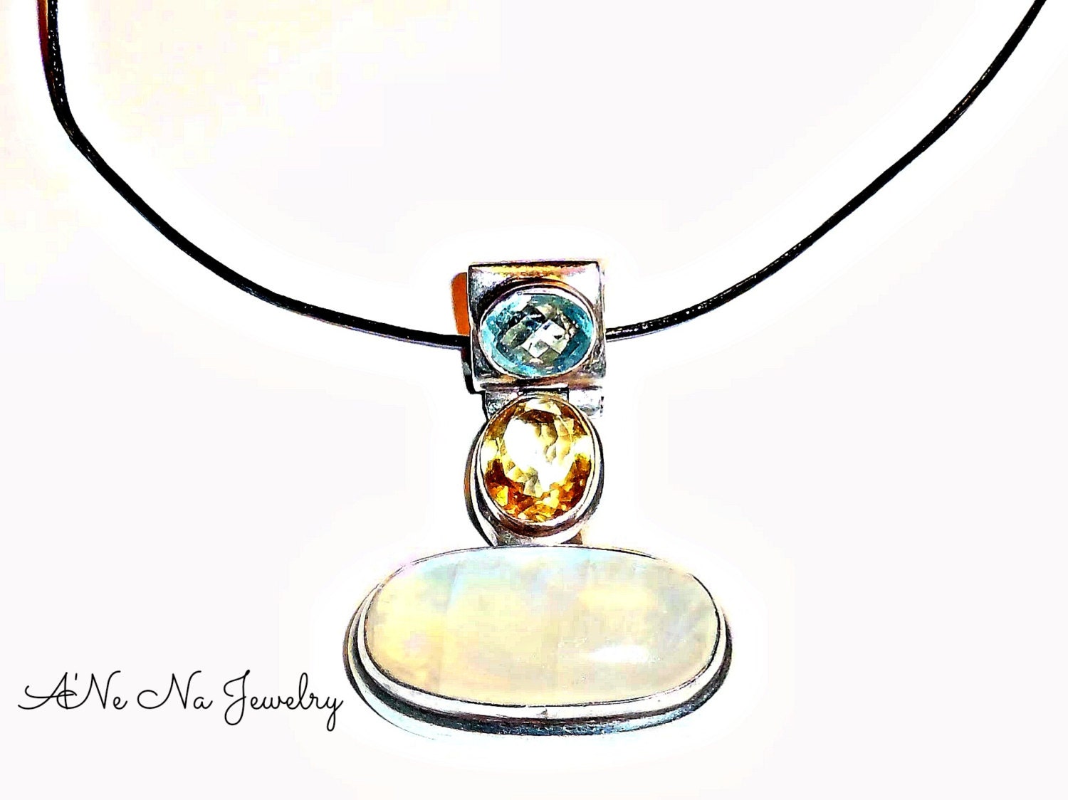 Mufti-Faceted, Multi Gemstone Pendant On Leather Chord ( Rainbow Moonstone, Topaz, Garnet, Peridot ) Magical