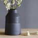 one black vase. matte black stoneware bottle / vase. modern minimal pottery ceramic