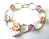 Soft pink antique glass button bracelet, 1800s china stencil buttons, dichroic glass,  hammered oval silver links