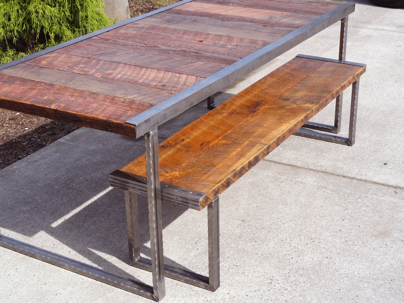 6 ft industrial bench with rectangular steel legs and raw steel trim