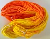 Mango banana. Chunky hand spun merino yarn. Hand painted in  mango orange to  banana yellow. Pure Australian 21 micron merino wool.