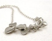 20 % VACATION SALE Chain of flowers necklace in matte silver