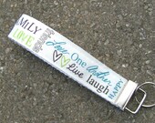 Keychain Wristlet Key Fob with Words of Inspiration on White Fabric Keychain