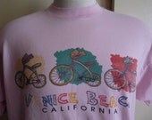 vintage 80's Venice Beach California travel souvenir graphic t-shirt pastel pink bike bicycle print men women unisex crew neck tee, fruit of