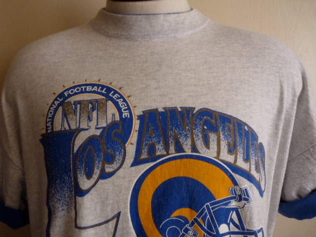 vintage 90's Los Angeles Rams NFL Football graphic t-shirt men women unisex crew neck tee double crew neck heather grey blue yellow gold