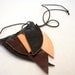 Natural recycled multicolour wings leather necklace. Black, brown and undyed leather.