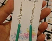 Turquoise spike stones on swirly silver wire
