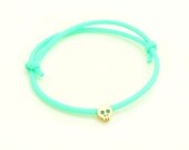 Mint and Gold Skull Bracelet - Rubber Bracelet W/ Tiny 14k Gold Plated Skull Charm In Mint