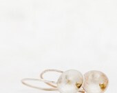 Silver earrings with a drop of gold