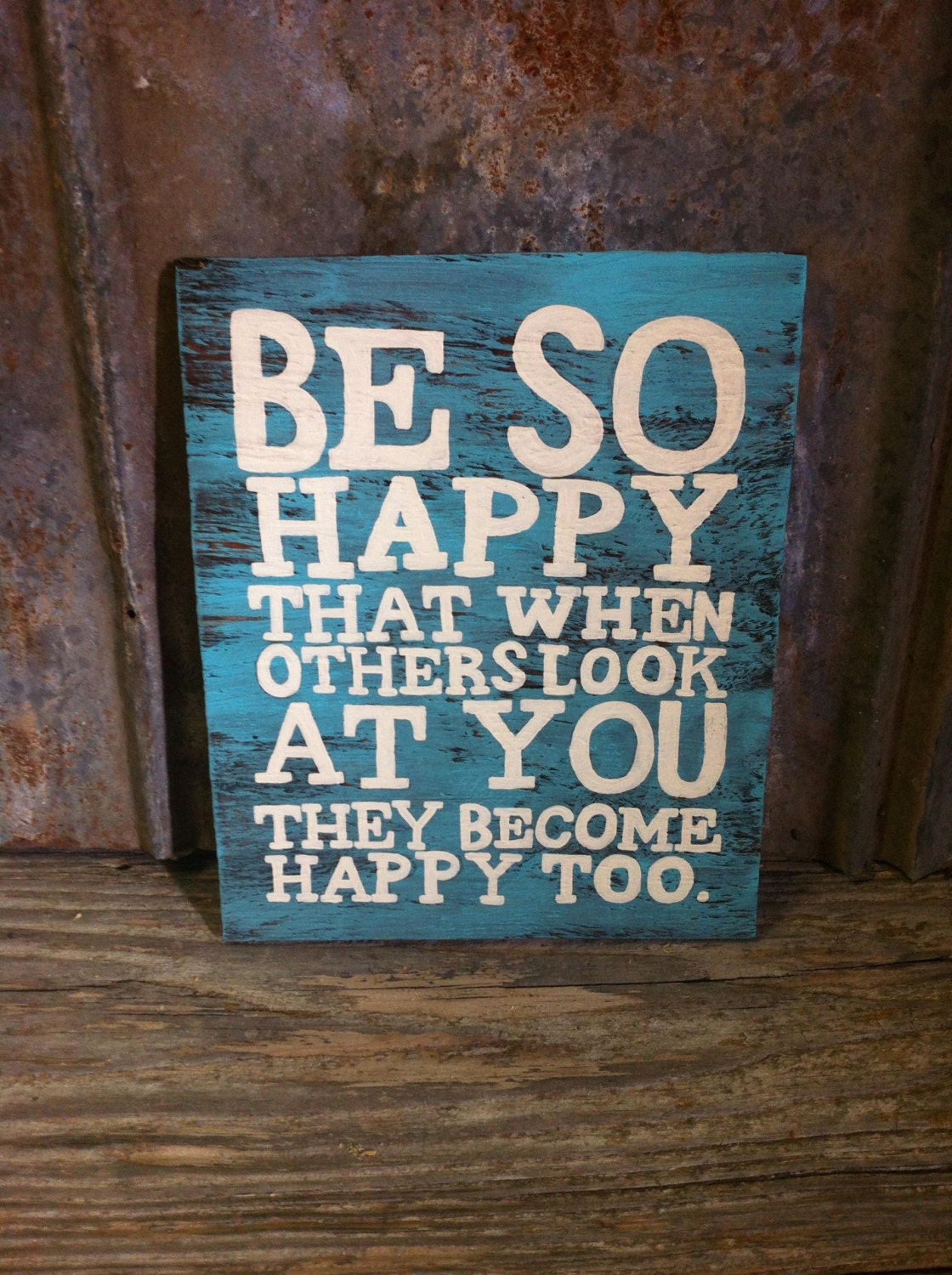 Hand crafted wooden sign "Be So Happy That When Others Look At You They Become Happy Too." Approx. 10.5x8.5" Turquoise and White