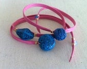 Cinnabar Wrap Bracelet: Triple Wrap in Pastel Pink  Leather with 3 Cyan Blue Carved Beads