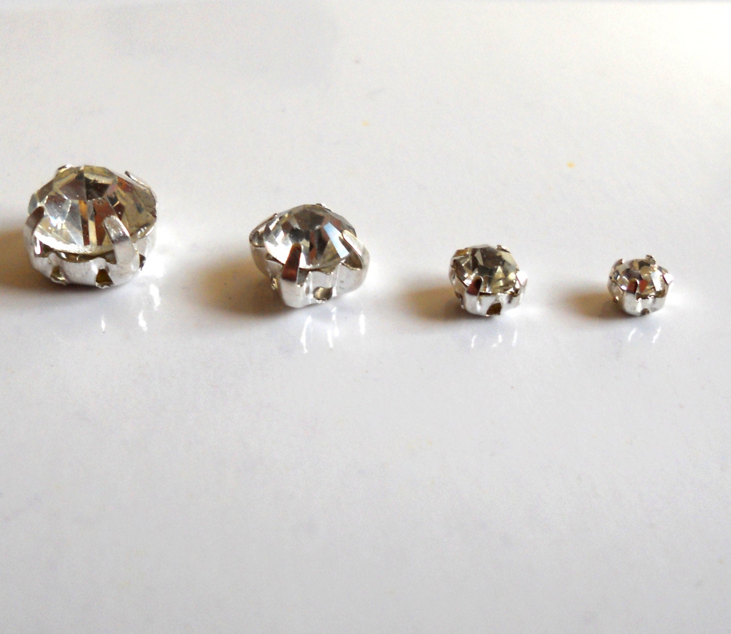 Crystals Sew On Rhinestone 4 mm Faceted Glass with metal brass prong setting with 4 holes by Folkstrokesupplies on Etsy 50 pieces