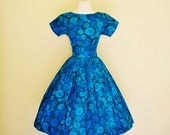 vintage 1950's Tommy Care spring in bloom blue and green floral pin up dress