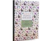 Natharie rete wrapping paper book with gift tag by 7321 Design