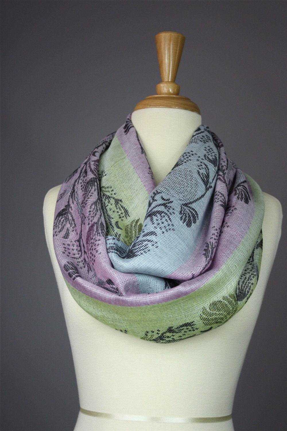 Lurex infinity scarf pastel colors with a floral stem design