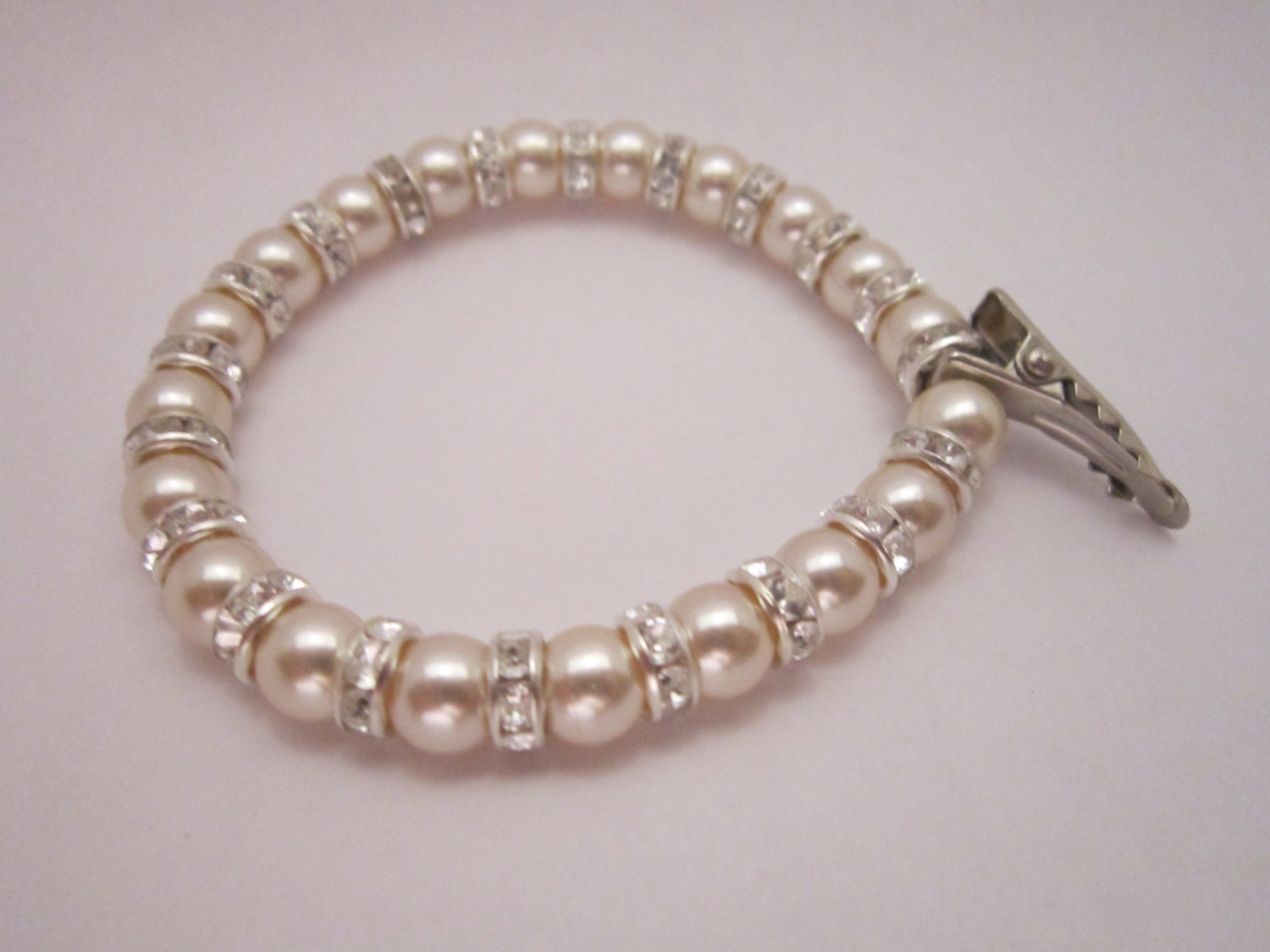 Warm toned( cream) genuine Pearl and cubic zirconia spacer temple bracelet