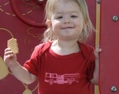 Fire Engine Femme baby bodysuit, 100% organic cotton